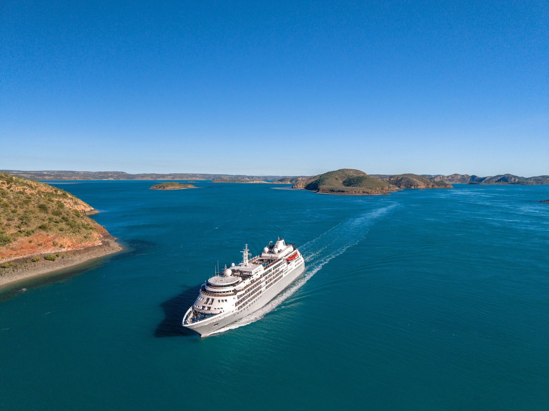 Expedition cruise ship sailing through the Kimberley